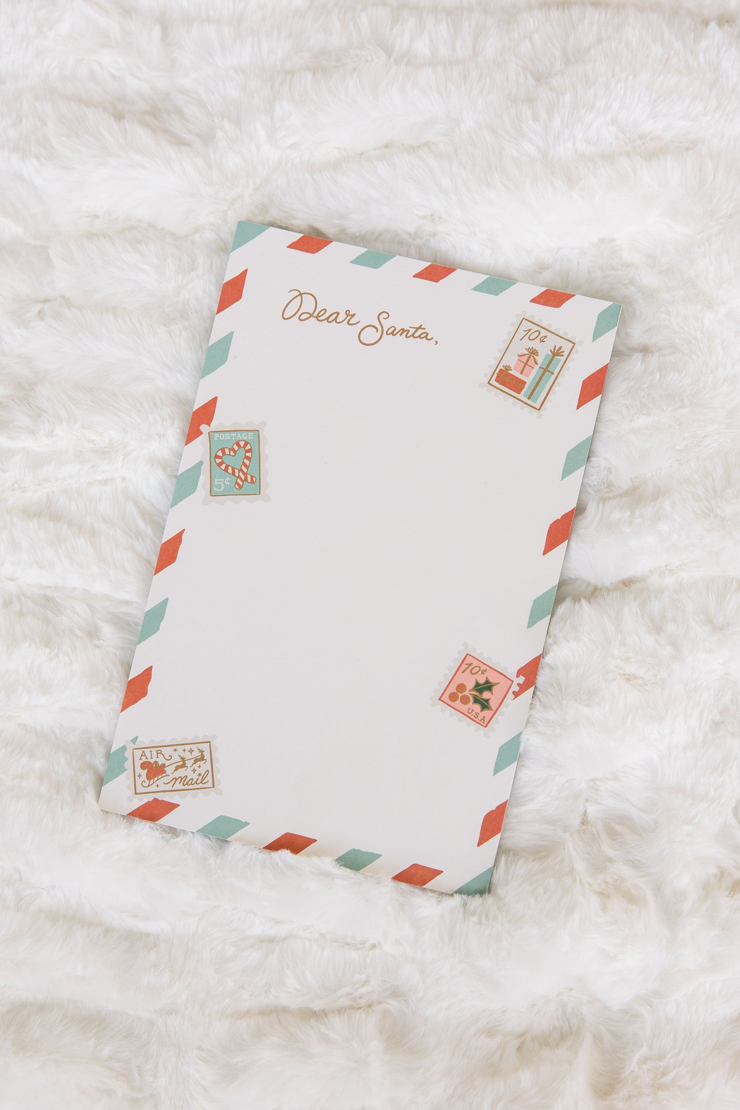 Letter to Santa with vintage design on a white fluffy surface