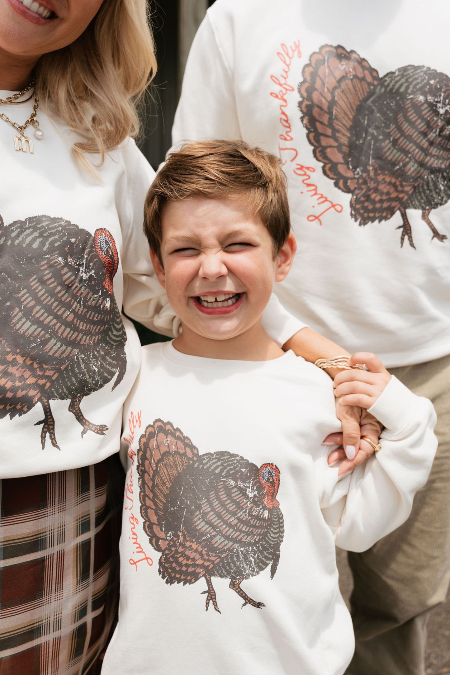 family in turkey sweatshirts 
