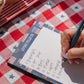 Flag notepad on tablecloth