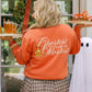 Orange sweatshirt saying ghostest with the mostest