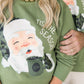 Green sweatshirt with a cartoon Santa Claus design and 'Tis the Season text.