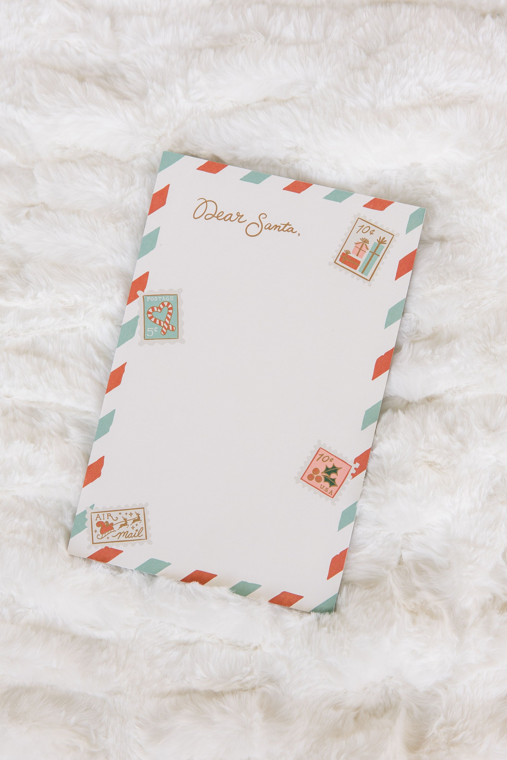 Letter to Santa with vintage design on a white fluffy surface